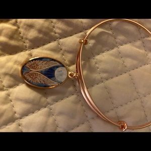 Alex and Ani angel wing bracelet.